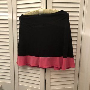 Golftini black skort with pink ruffled edge, 8